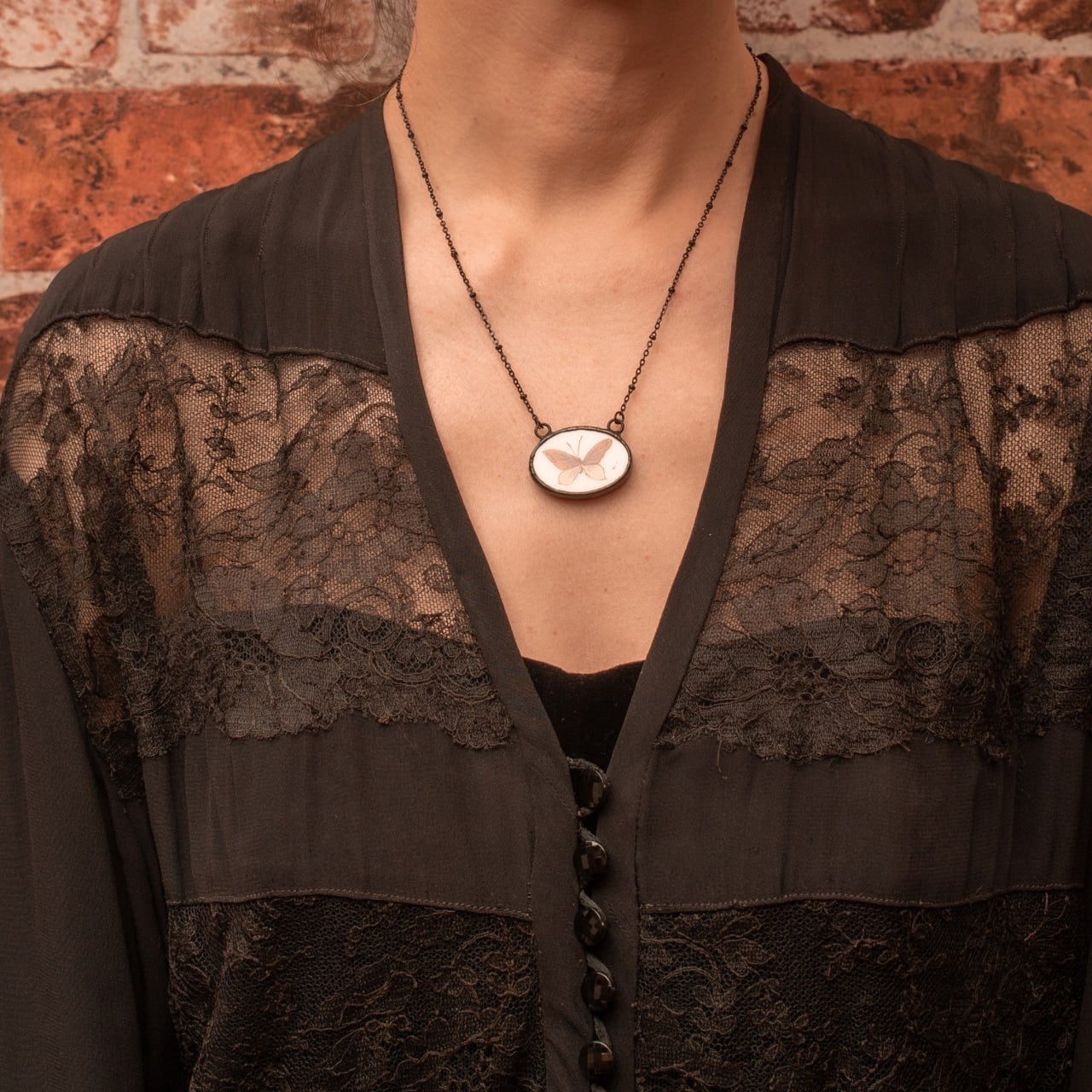 Collana con ciondolo farfalla piccola