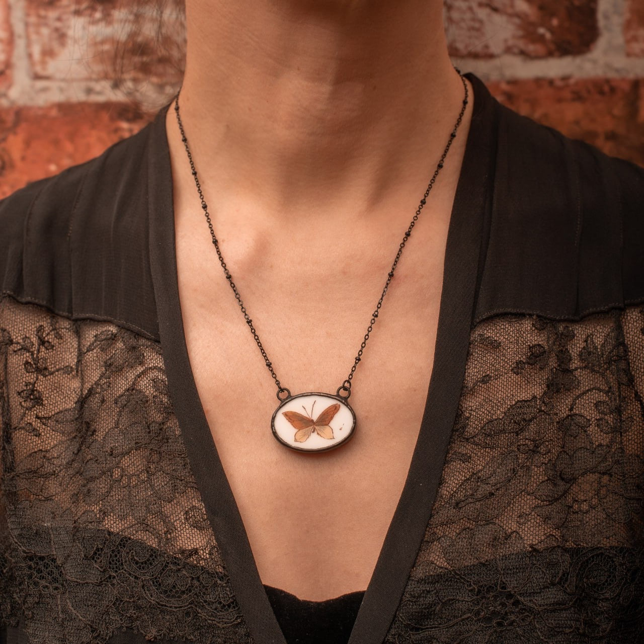 Collana con ciondolo farfalla piccola