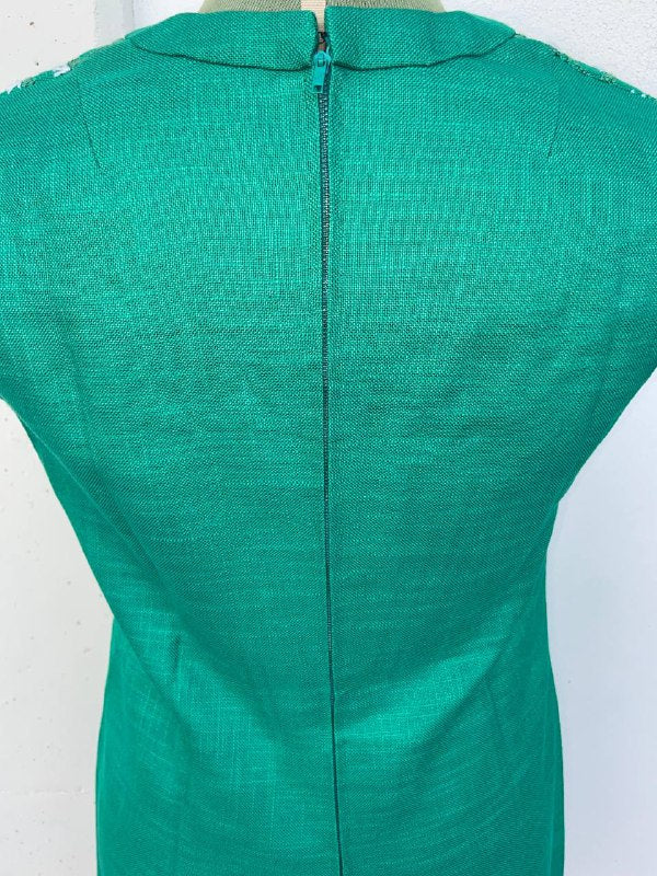 Abito sartoriale smanicato in lino