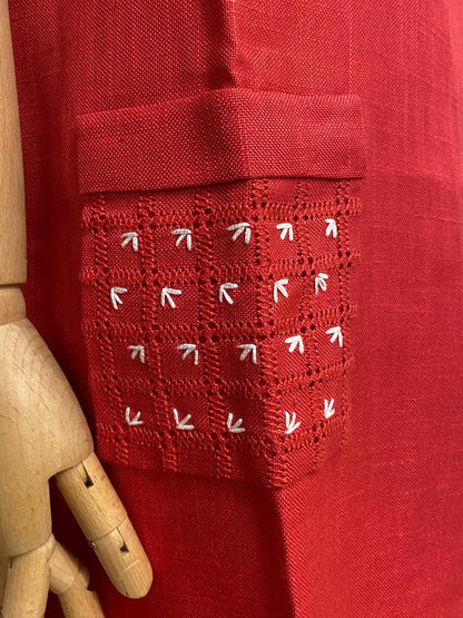 Abito sartoriale smanicato in lino
