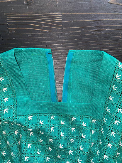 Abito sartoriale smanicato in lino